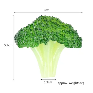 Realistic artificial broccoli food model keychain accessory measuring 6cm by 5.7cm