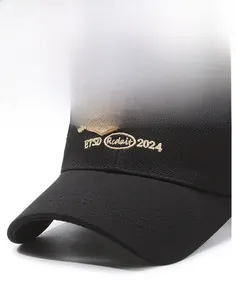 Detail of black mesh baseball cap showing gold 3D embroidery and durable fabric texture