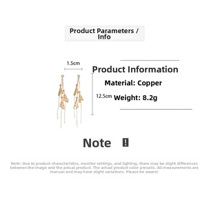 Detail view of 18K gold plated long tassel earrings with dimensions 1.5cm by 12.5cm