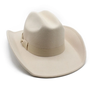 Detail of cream felt cowboy hat showing saddle crease and grosgrain ribbon band