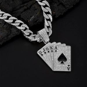 Silver iced-out Cuban link chain with a sparkling Royal Flush poker cards pendant