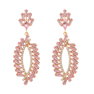 Elegant gold earrings with pink gemstones, crystal accents and stylish long tassels