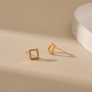 Square hollow earrings in 18K gold plating with sparkling cubic zirconia pavé
