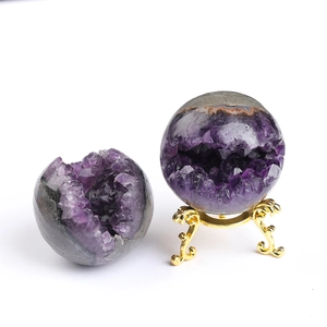 Uruguay natural amethyst geode sphere set with purple crystal cluster on metal stand
