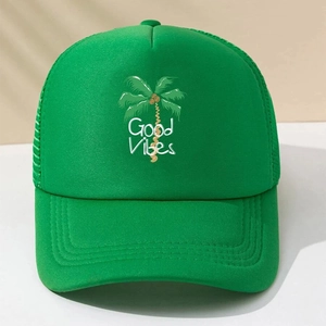 Green mesh trucker hat with coconut tree print and Good Vibes text for summer sun protection