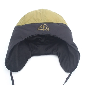 Waterproof winter trapper hat with warm fleece lining and ear flaps for skiing