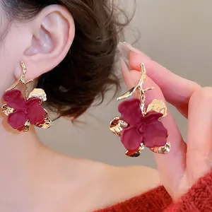 Elegant large deep red matte flower earrings with golden branches and silver needles