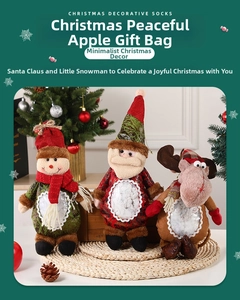Detailed view of three Christmas gift bags featuring Santa, snowman, and reindeer designs