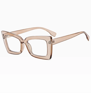 Detailed close-up of transparent champagne oversized frames with a retro futuristic design