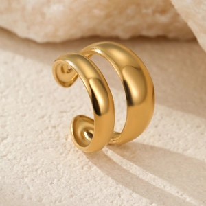 Macro shot of minimalist double-layered open ring in 18k gold plated stainless steel