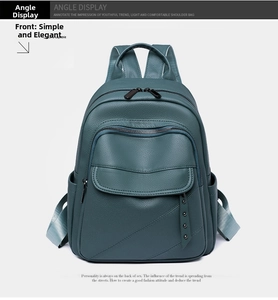 Detail view of teal blue PU leather backpack with rivet accents and multiple zippers