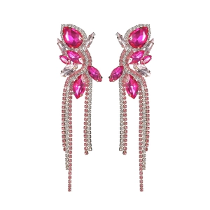 Detail of rose red crystal tassel earrings with sparkling rhinestone bow knot design
