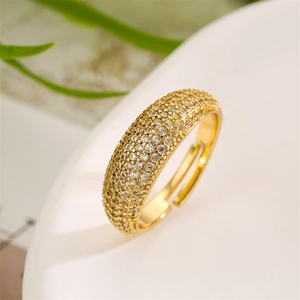 Close-up of gold-plated adjustable ring with micro-pave cubic zirconia stones