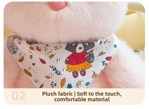 Close-up of soft pink plush fabric and a cartoon raccoon pattern neck scarf