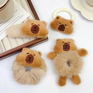Adorable 4-piece Capybara plush hair accessory set including scrunchies and hair clips