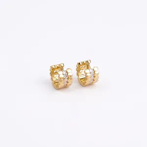 Elegant gold hollow hoop earrings with cubic zirconia and vintage beaded texture details