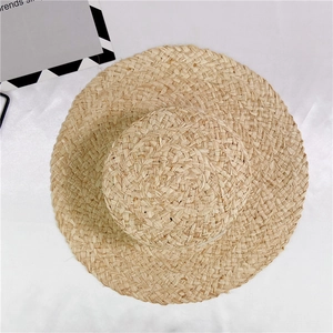 Wide brim hand-woven raffia straw sun hat with flat top for women summer beach vacation