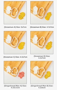 Detailed view of 6-piece Snowman and Gingerbread Man cookie molds with size measurements