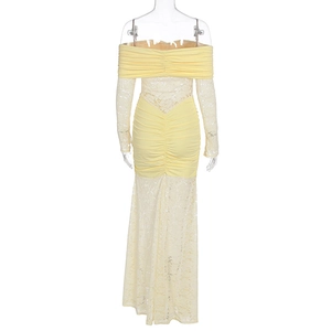 Detail of yellow off-shoulder dress with white lace sleeves and ruched texture