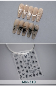 Detail of MN-319 nail stickers featuring embossed butterfly and rose line art patterns