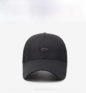 Detail of black sports cap featuring breathable mesh back and mountain embroidery