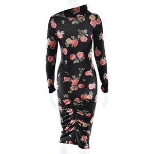 Close-up of the rose floral print detail and ruched back tailoring on a slim fit dress