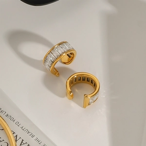 Minimalist gold-plated C-shaped ear cuffs set with rectangular cubic zirconia stones