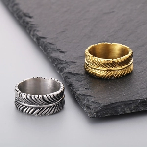 Retro feather textured stainless steel rings in gold and silver finish for a vintage look