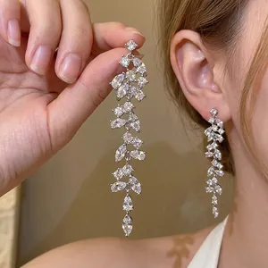 Long tassel drop earrings featuring leaf-shaped marquise zircons in silver setting
