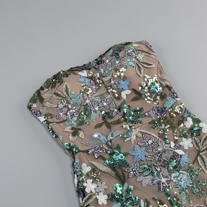 Detailed view of champagne mesh evening dress with blue and purple sequin floral embroidery