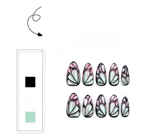 Macro detail of 3D butterfly press-on nails with pink and green cat-eye gradient finish