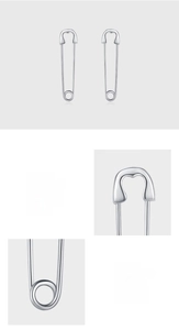 Macro detail of polished 925 sterling silver paperclip earrings with mirror-like finish