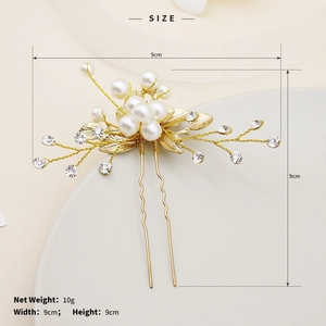 Detail of bridal pearl hair pin with gold leaves showing 9cm width and 9cm height dimensions