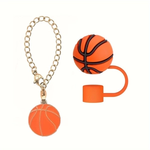 Detailed view of basketball pendant gold chain and orange silicone straw topper accessory