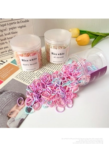 Colorful high elasticity hair bands for girls in a clear bottle with vibrant tulip decor