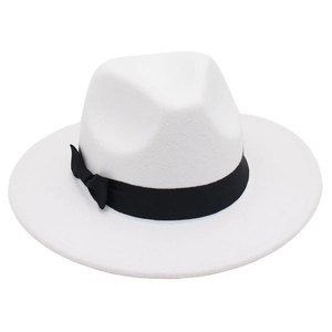 Detail of white felt fedora hat featuring a contrasting black bow ribbon on a white background