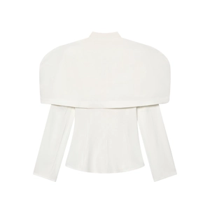 Detail of white long-sleeved blazer featuring a unique cape silhouette and tailored waist
