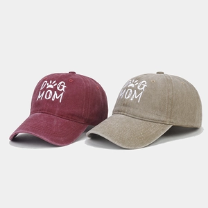 Washed cotton baseball cap with Dog Mom embroidery in burgundy and khaki colors