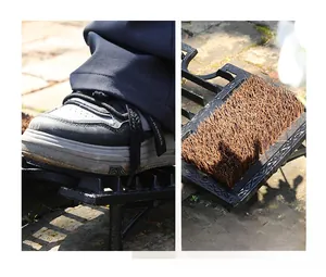 Detail showing the heavy-duty cast iron boot scraper with dense bristles for shoe cleaning