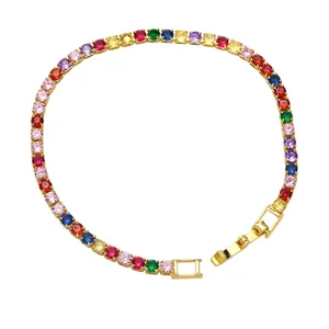 Rainbow cubic zirconia tennis bracelet with gold plating and fold-over clasp