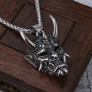 Samurai Hannya devil mask pendant in vintage stainless steel with a braided chain