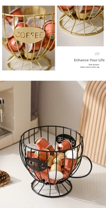 Macro detail of cup-shaped metal coffee pod basket with cutout COFFEE design
