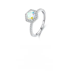 Detail of S925 sterling silver ring with hexagonal cluster setting and side accent stones