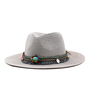 Grey bohemian straw fedora hat with ethnic woven band and turquoise stone detail
