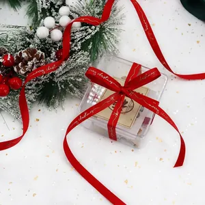 Red Christmas ribbon with gold Merry Christmas lettering for gift boxes and holiday decor