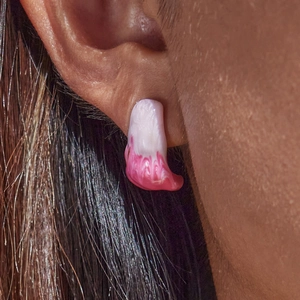 Romantic dual-tone pink drip oil earrings in 18K gold stainless steel on a model