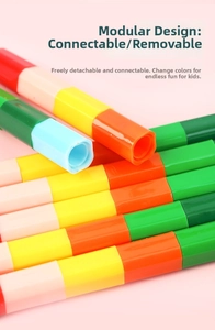 Close-up of detachable 12-color building block crayons showing modular stacking design