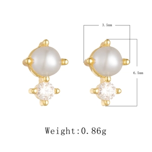 Detailed view of gold pearl stud earrings showing 6.5mm height and 0.86g weight dimensions