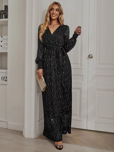 Elegant black V-neck midi dress with white polka dots and belted waist detail