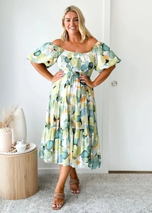 Off-shoulder summer maxi dress with bubble sleeves and colorful geometric dot patterns